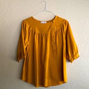 NWOT Mustard yellow blouse.